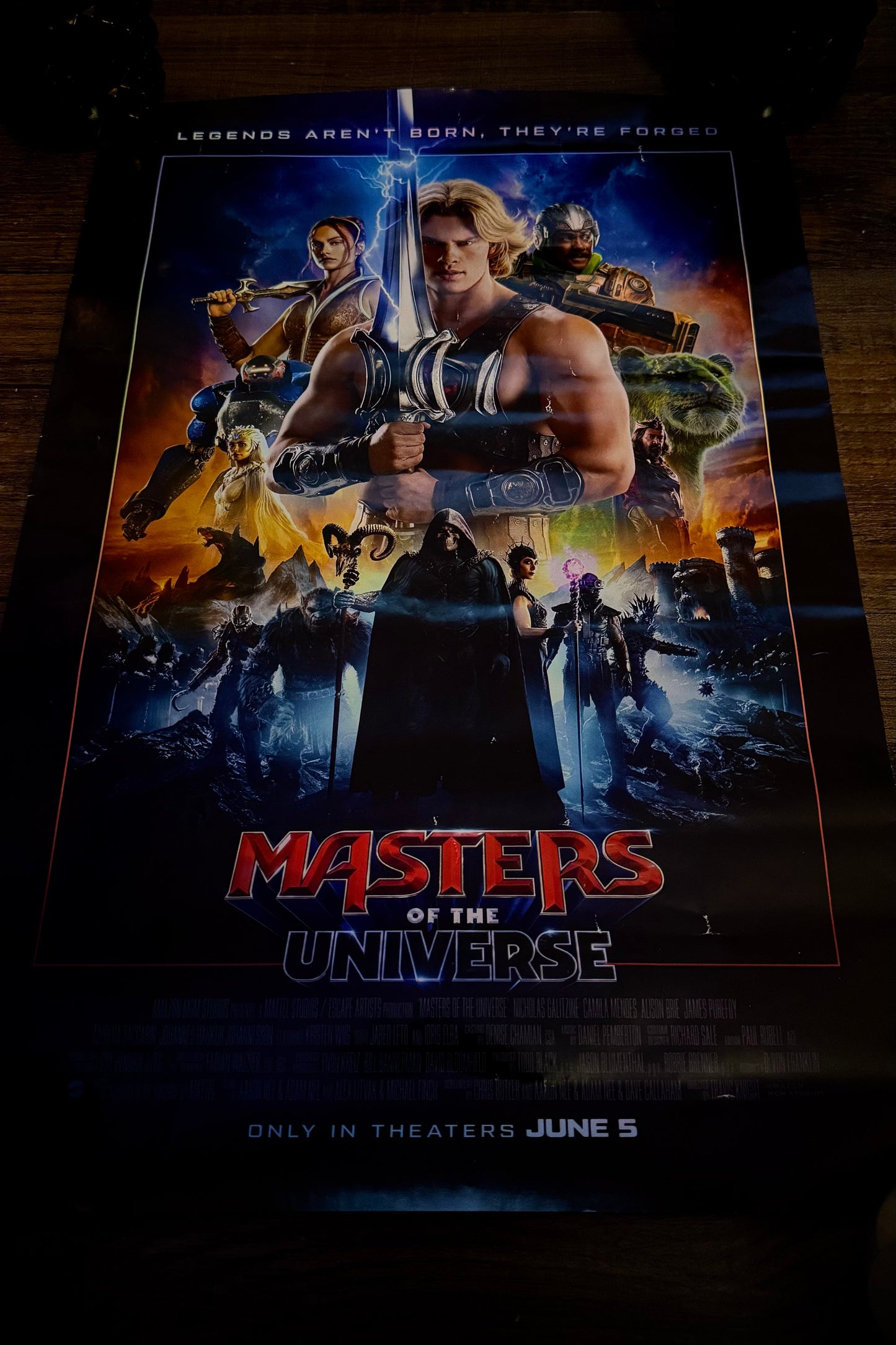 Movie poster for 'Masters of the Universe' with characters and text.