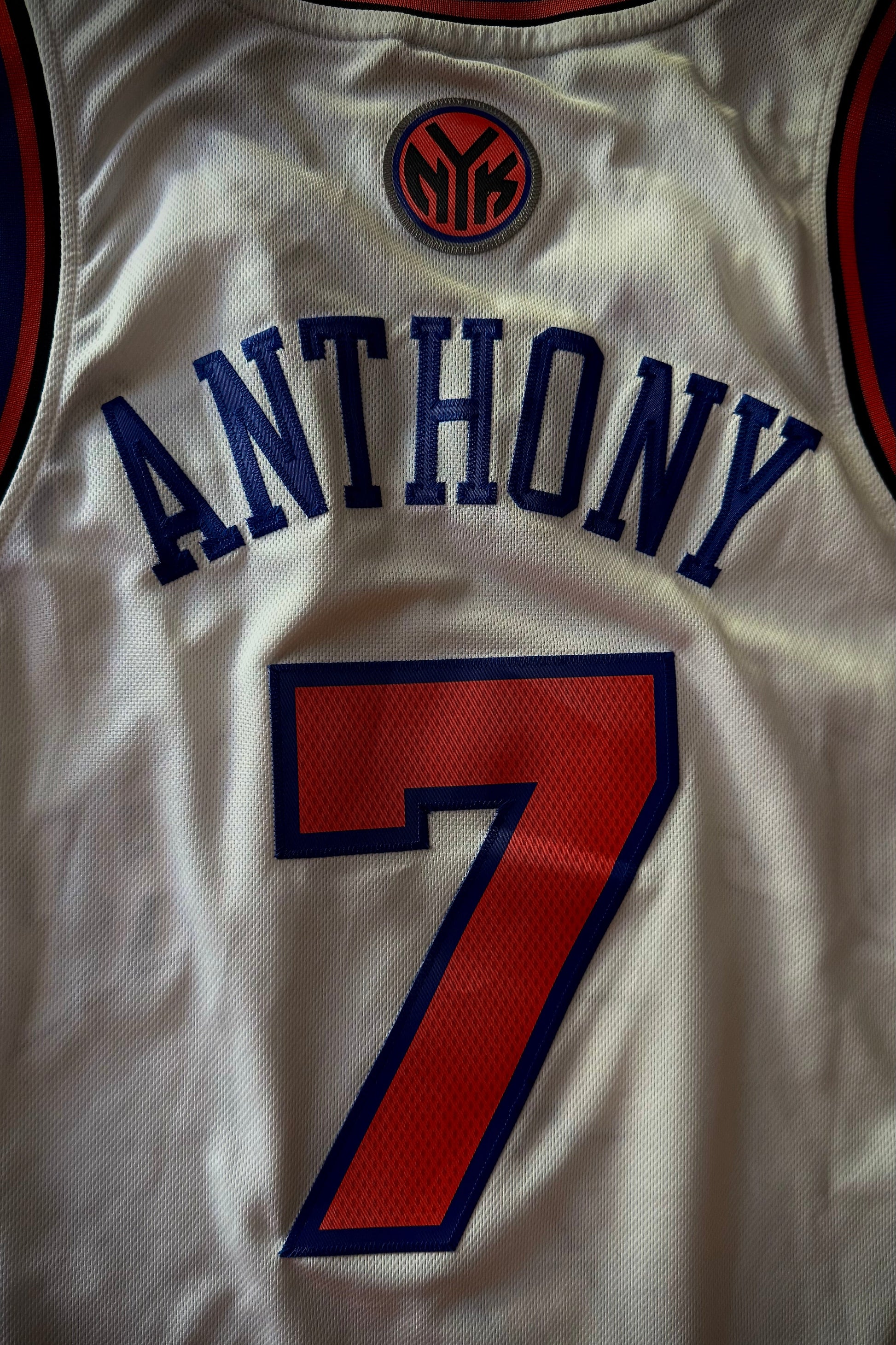 Basketball jersey with 'Anthony' and number '7' on a white background